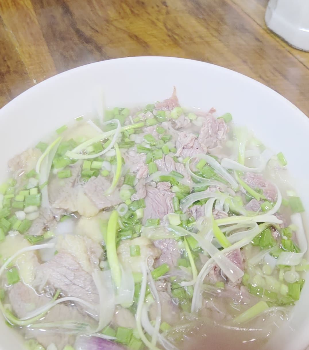 Phở being ladled from the broth pot at Tre Việt Nam