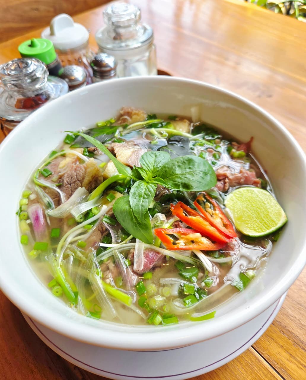 Phở Bò — rare beef pho on the 48-hour broth